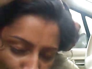 Lewd sinful Desi nympho with gloomy hair wanks and sucks dick in the car